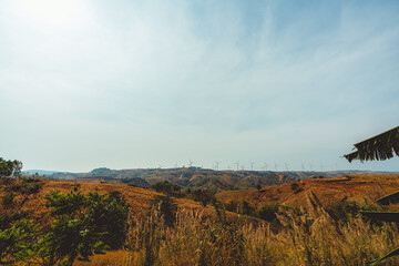beautiful blue sky high peak mountains mist fog wildlife green forest at Khao Koh, Phu Tub Berk, Phetchabun, Thailand guiding idea long weekend for backpacker camping campfire relaxing hiking