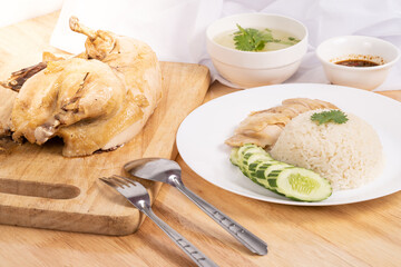 Chicken rice on the wooden table.