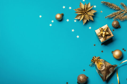 Blue christmas background with golden christmas decorations