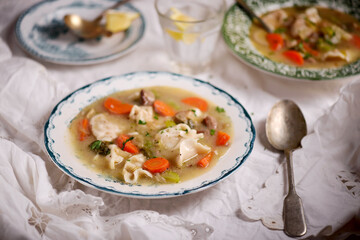 Warsaw pierogi soup.. Traditional Polish dish..style rustic.
