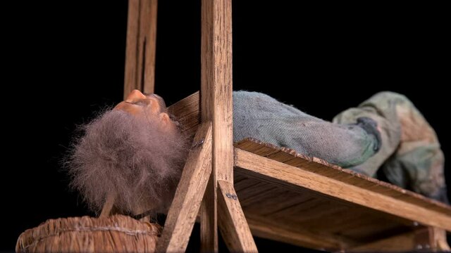 The guillotine cuts off the head of the criminal. Previously, such an execution was considered humane. The video shows a mockup that shows how the device works