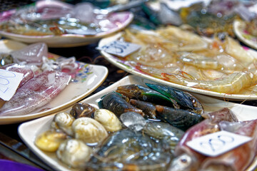 Fresh seafood plate in the fishing market in Thailand
