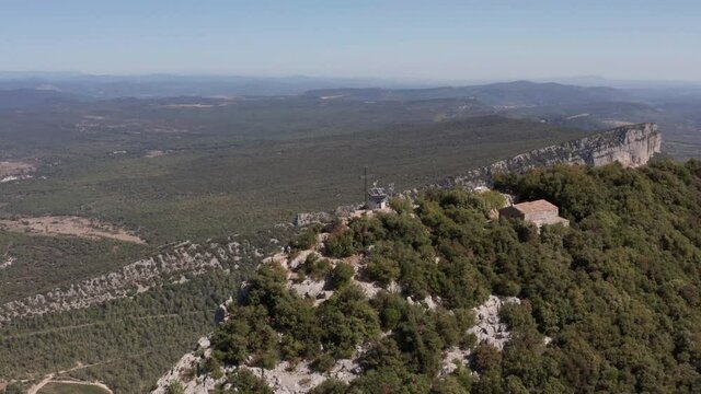 aerial view of a mountain and a big forest around, pic st loup summit in france, near to Montpellier 