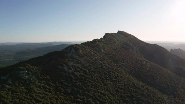 aerial view of a mountain and a big forest around, pic st loup summit in france, near to Montpellier 