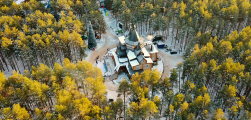 The residence of Russian Santa Claus is surrounded by forest. The view from the height of bird...