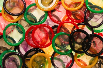 Colorful condoms background.