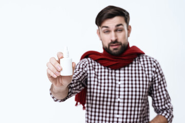 Man shows spray from a serious illness. 