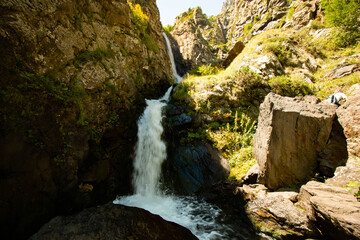 waterfall falling from the cliff
