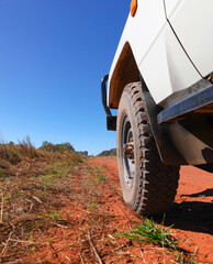Four wheel drive wheel on red dirt road in the Kimberley region in Western Australia