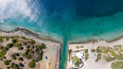 Fototapeta na wymiar Peloponnese, Greece Aerial view on turqouise blue water and sandy beach. Limni Vouliagmeni or Ireon Lake, 