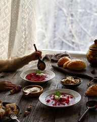 Traditional Russian lunch with borsch and pies