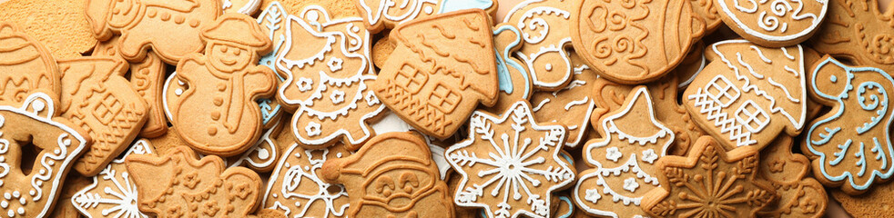 Tasty Christmas cookie on whole background, top view