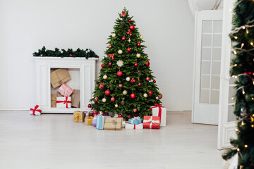 Perfect Christmas tree with gifts underneath in living room