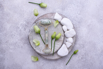Green jade facial roller for skincare