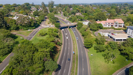 road, landscape, nature, river, travel, sky, hill, highway, green, mountain, summer, tree, country, view, way, panorama, transportation, water, aerial, countryside, city, panoramic, rural, forest, mou