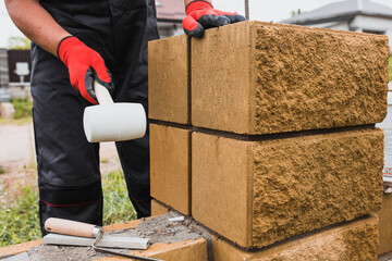 Cement mortar for bonding concrete blocks in the construction of a fence wall - masonry