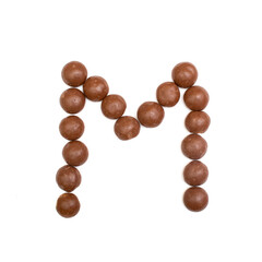 The 'M' written in chocolate Pepernoten