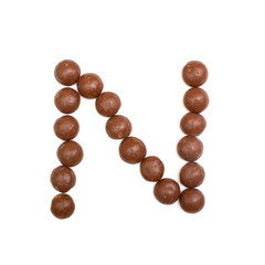 The 'N' written in chocolate Pepernoten