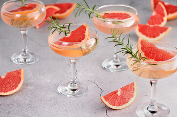 Сocktail Mimosa.  Grapefruit, rosemary and sparkling wine