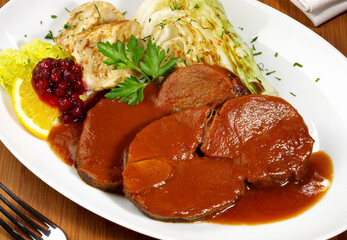 Roasted Deer Meat with Cranberries and Apricots