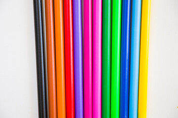 Colorful markets gradient on the white background, markers for painting and drawing