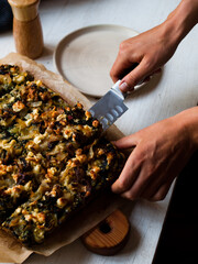 Rustic farmhouse spinach quiche in natural light