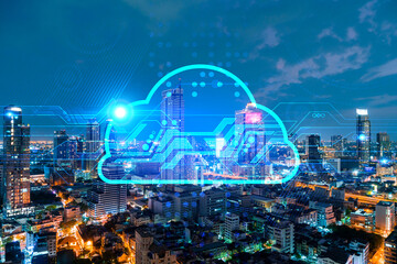 Information cloud hologram, aerial panoramic cityscape of Bangkok at night. The concept of secure storing digital data in Asia. Multi exposure.