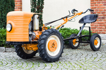 old-style tractor, Museum exhibit, old equipment.