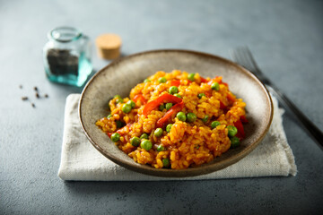 Vegetarian paella with capsicum and green pea