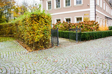 Park, autumn, shrubbery, stone pavement, gate.