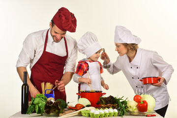 Family cooking together. Family cooking together. Healthy food at home. Healthy lifestyle. Advertising. Restaurant.