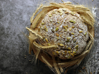 Round bread with seeds. Top View.