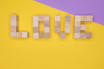 Cube wooden toy blocks with the message 