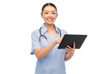 medicine, profession and healthcare concept - happy smiling asian female doctor or nurse in blue uniform with tablet pc computer and stethoscope over white background