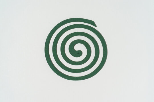 Flat lay mosquito coil on a white background