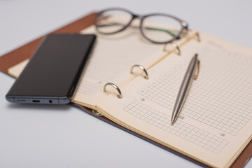 notebook and glasses