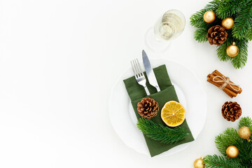 Table setting for new year with toys decorations and champagne  on white background top view