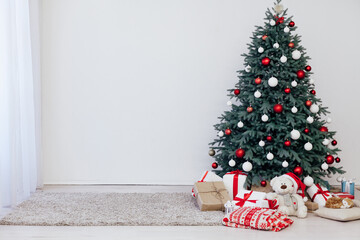 Beautiful Christmas decor of residential white room with stucco