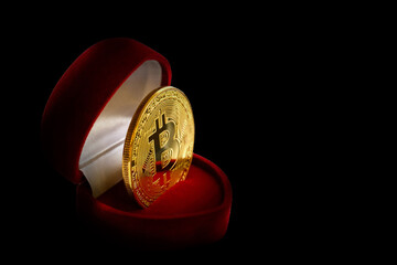 Coin bitcoin in a gift box for a ring or jewelry the concept of crypto currency the best gift
