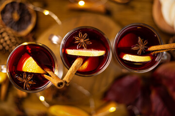 Christmas magic atmosphere, home celebration. Hot mulled wine, spices and festive decorations....