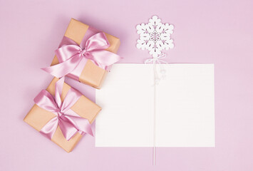 Gifts, blank sheet and christmas decorations