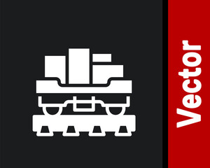 White Cargo train wagon icon isolated on black background. Full freight car. Railroad transportation. Vector.