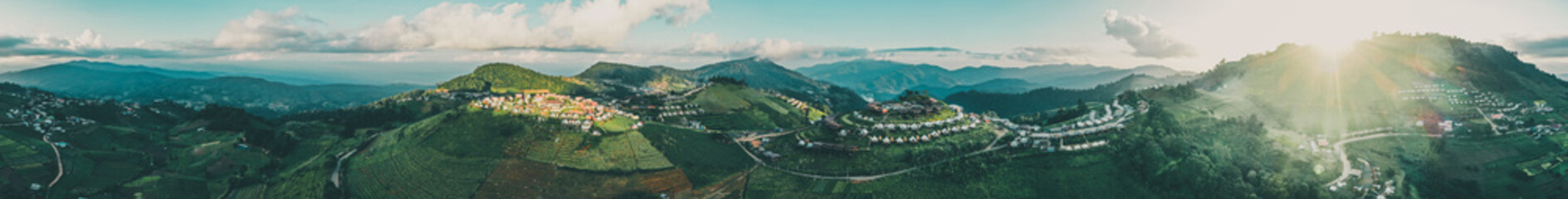 Obraz premium Aerial view of camping grounds and tents on Doi Mon Cham mountain in Mae Rim, Chiang Mai province, Thailand