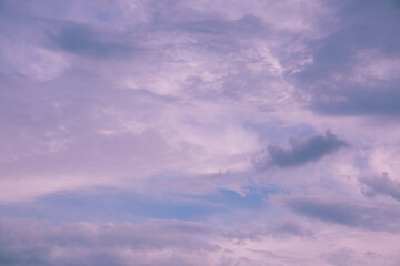 The texture of the pink blue sky with many beautiful clouds.