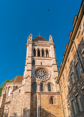 Fototapeta na wymiar View of St. Pierre Cathedra in Geneva, Switzerland. The tower of church with rose window.