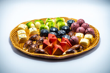 set of chocolate praline isolated on white background, selective focus