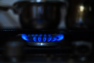 Blue flame of a gas stove.