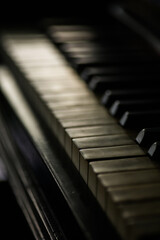 Old piano keyboard, with shallow depth of field