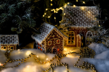 Fabulous photo with Christmas New Year decorations from gingerbread huts and magic lights