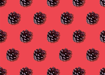 pattern of pine cones on a red background